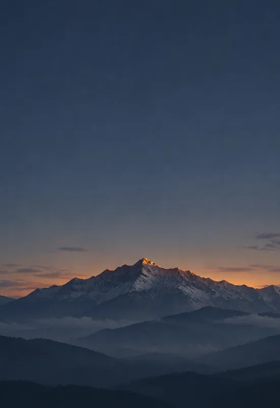 iPhone Duo alpine dusk wallpaper for the cover screen, a snow-capped mountain ridge under a deep blue dusk sky with a thin amber horizon, 1398x2034 px